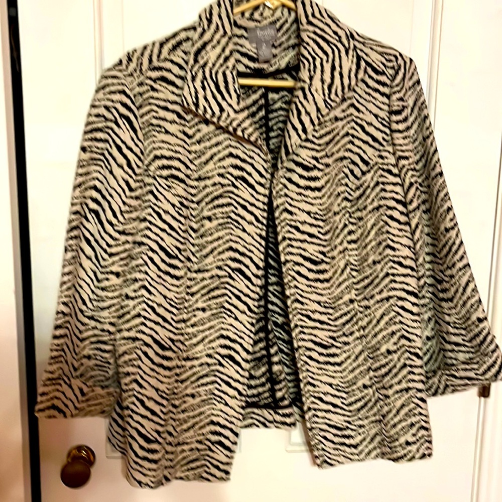 Chicos animal print jacket, size 2. Equal to 12